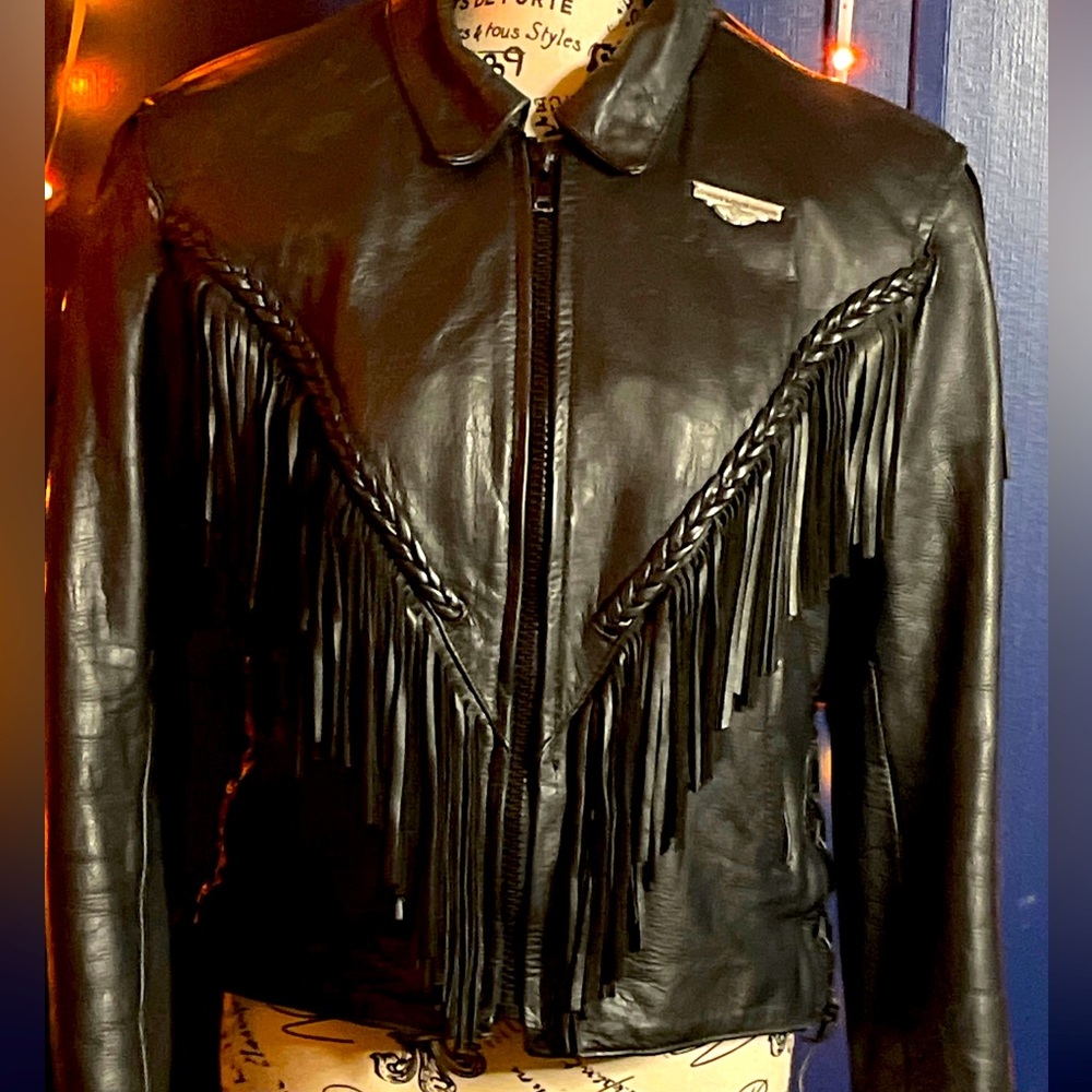 COPY - EUC Ladies Leather jacket with fringe and braided accents.
